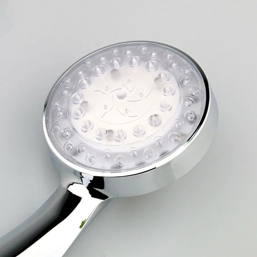 Illuminating LED shower head that cycles through 7 vibrant colors