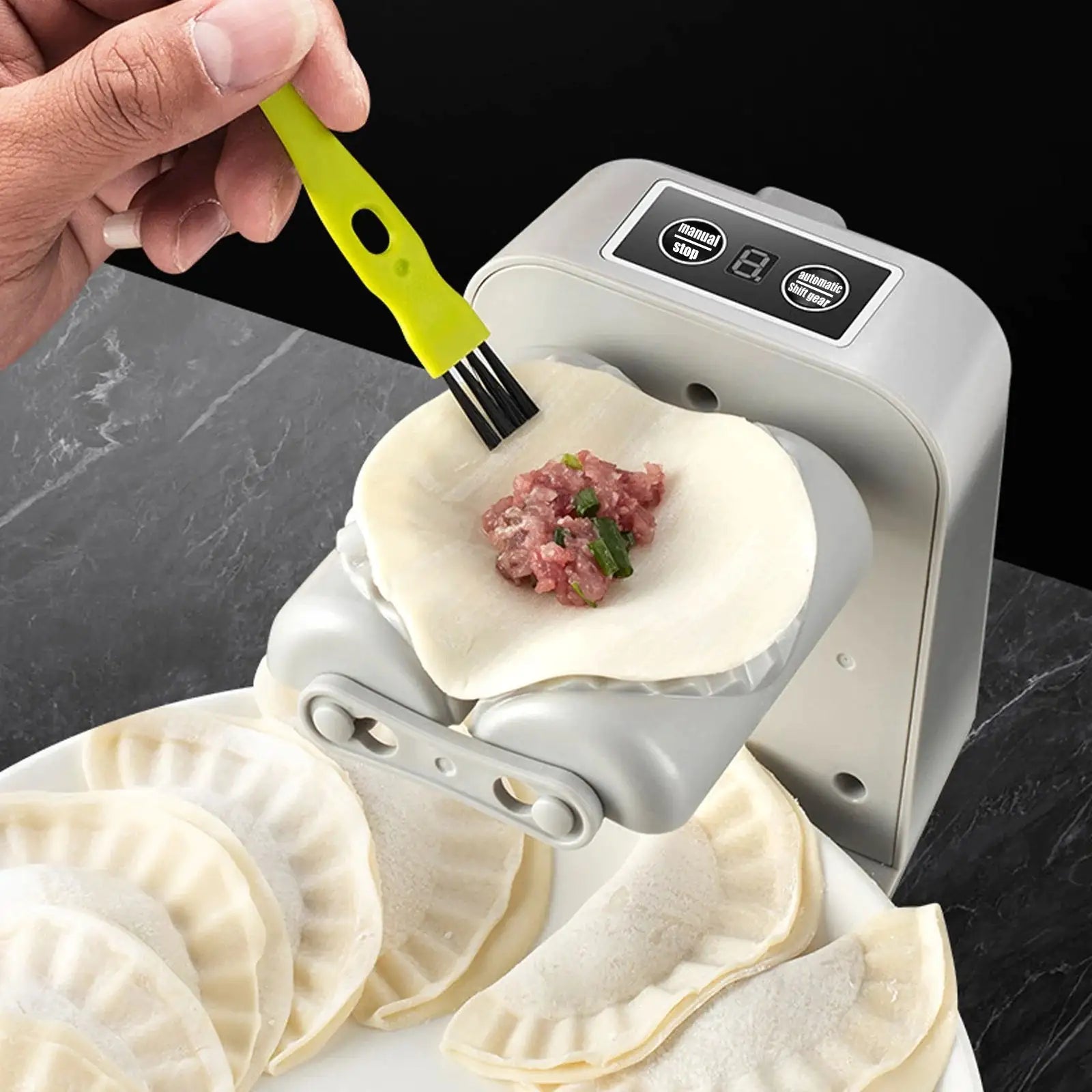 Easy-to-use fully automatic dumpling maker, saving time and effort in food preparation