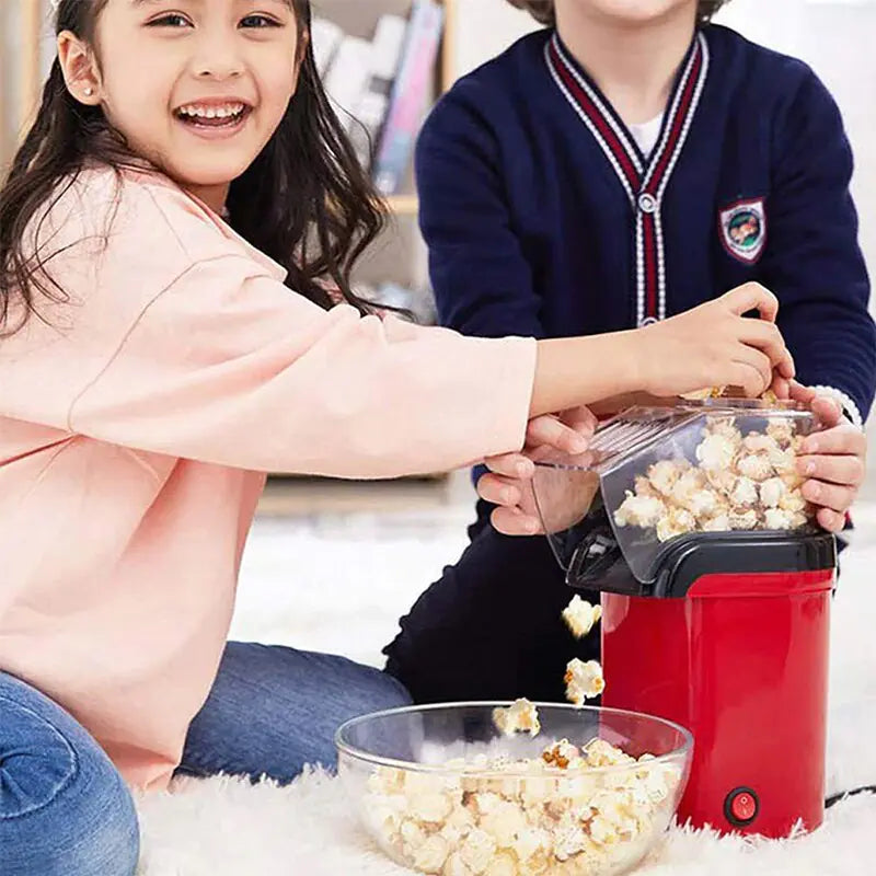 Easy-to-use Mini Popcorn Machine pops delicious popcorn in minutes