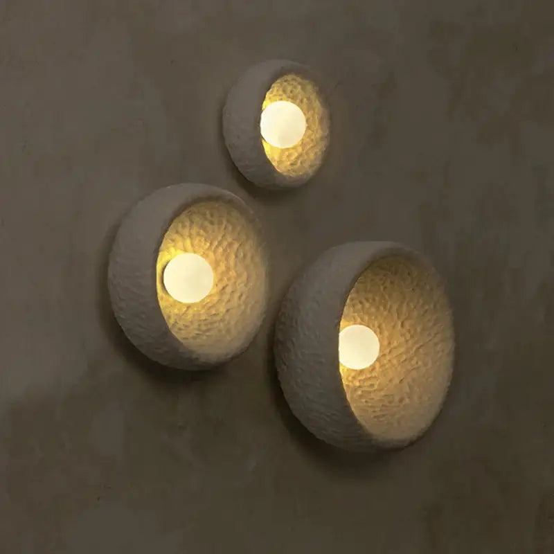 Space-saving Yua wall light provides subtle illumination without clutter